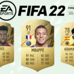 Mpabbe, Davies and Traore with FIFA 22 logo