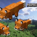 Two adult foxes and a baby fox in Minecraft