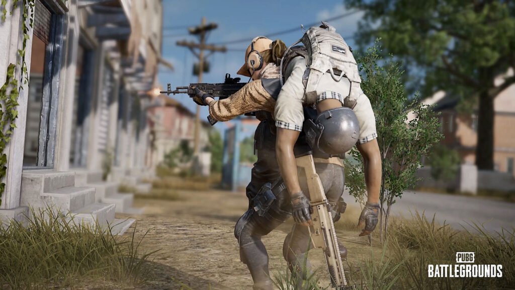 Jugador de PUBG cargando a un compañero caído