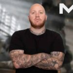 timthetatman with arms folded