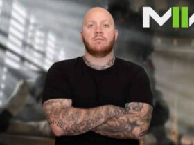 timthetatman with arms folded