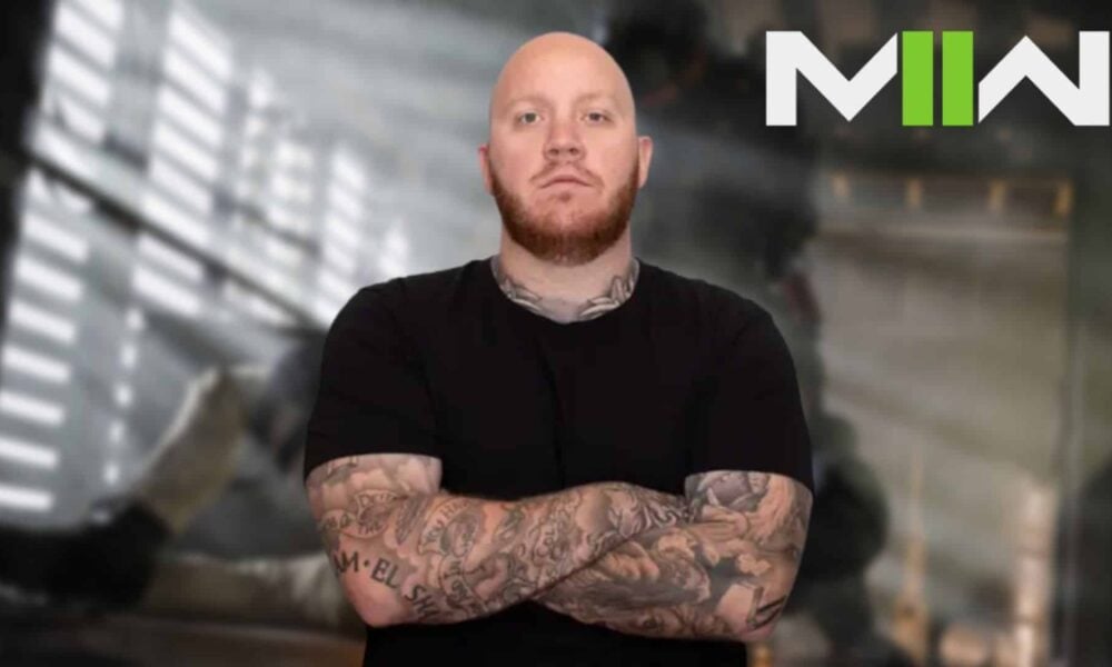 timthetatman with arms folded