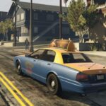 gta online taxi cab driving down road