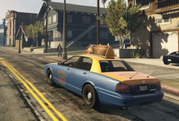 gta online taxi cab driving down road