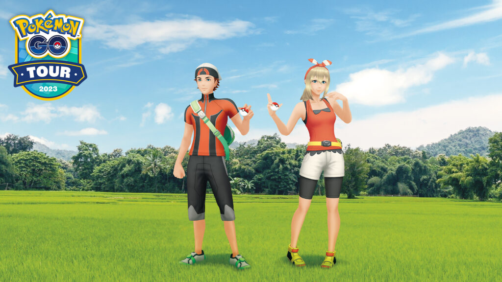 Entrenadores Pokémon en un campo con el logo de Pokémon Go Tour 2023