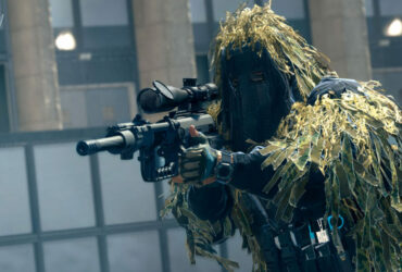 Warzone 2 character with Intervention sniper rifle and ghillie suit