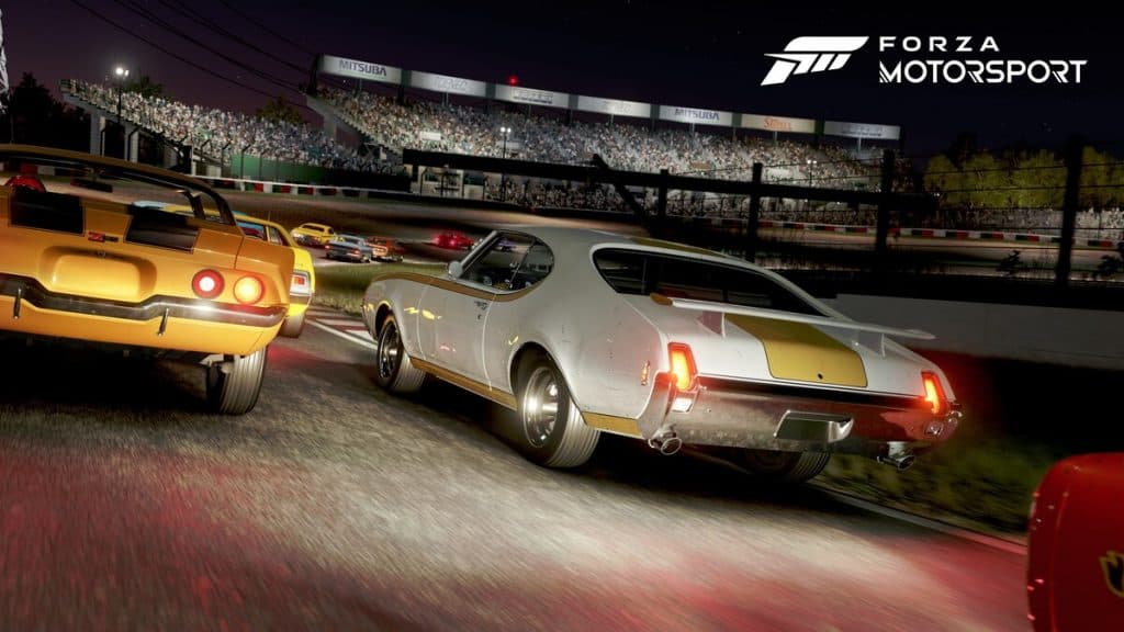 Dos coches compitiendo de noche en Forza Motorsport