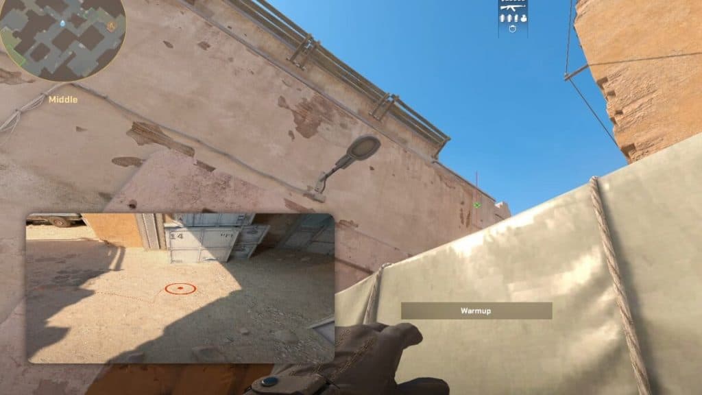 Manteniendo la alineación de humo para el desove de CT medio en Dust 2 en CS2