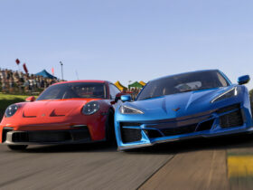 Blue and red cars touch and go while racing in Forza Motorsport