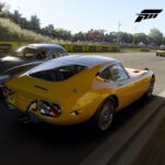 Yellow and other oldie car racing in Forza Motorsport