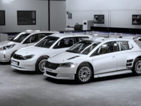 Three white rally cars all lined up to be customised in EA Sports WRC