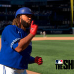 Vladimir Guerrero Jr celebrating a run in MLB The Show 24.