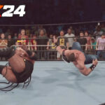 John Cena breaking the ring with Rikishi in WWE 2K24