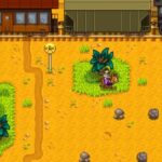 Player near a train passing in Stardew Valley