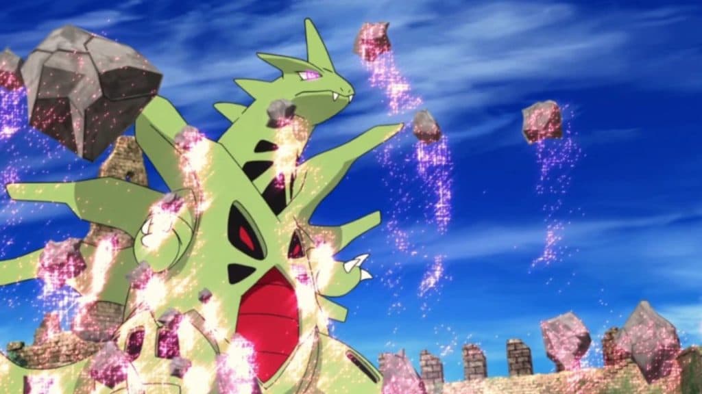 Pokémon mega tyranitar va usando un movimiento tipo roca en el anime