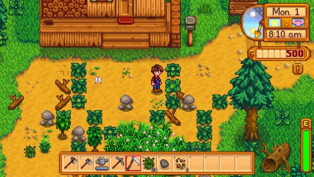 Jugador de Stardew Valley parado junto a un arbusto exclusivo de Forest Farm